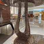 Round Sofa Side Table with Radial Natural Wood Veneer Top Sculptural Loop Pedestal and Circular Base